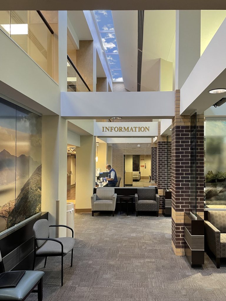 Iowa Lutheran Hospital Lobby with a 54ft Sky Factory Revelation SkyCeiling above the information desk and hallway