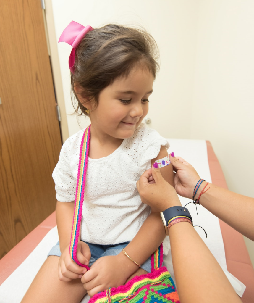 Child Getting a band aid after shot