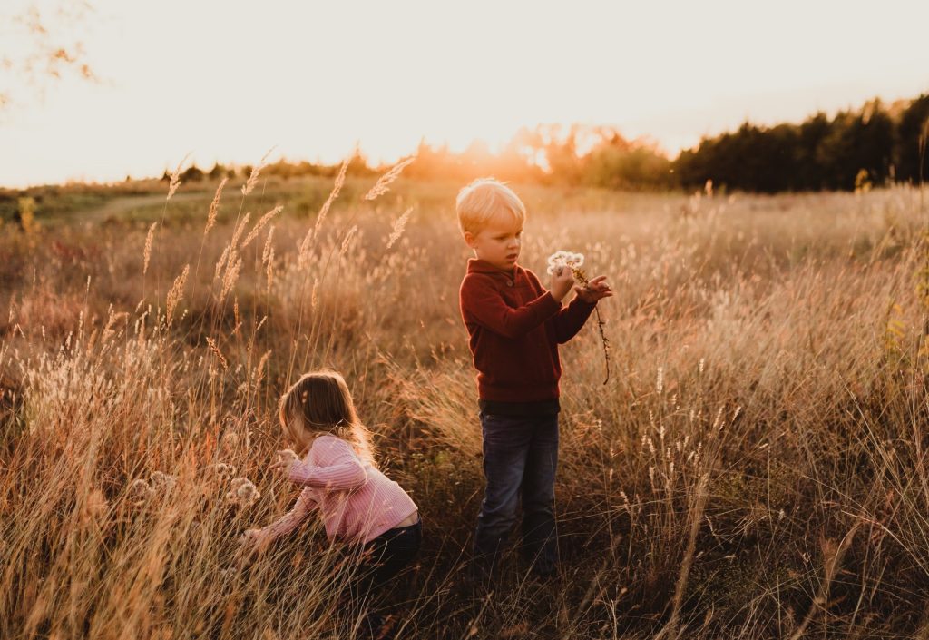 Children Playing in Field by Patty Britto